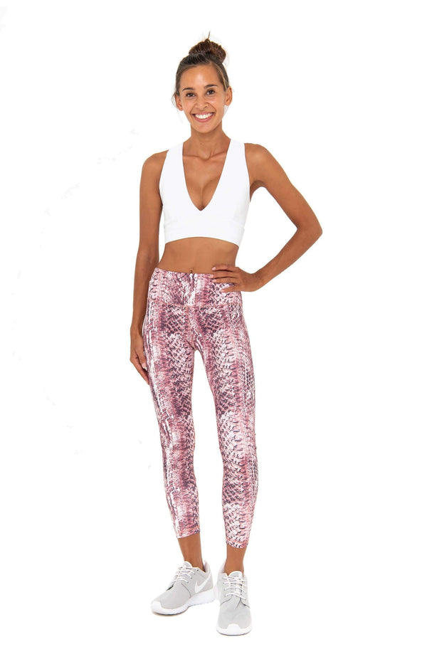 Pink sports leggings with snake print